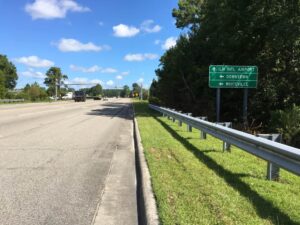 intersection in Wilmington with sign showing how to get on hwy 74