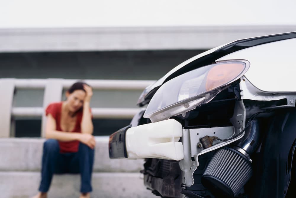 woman frustrated after car accident