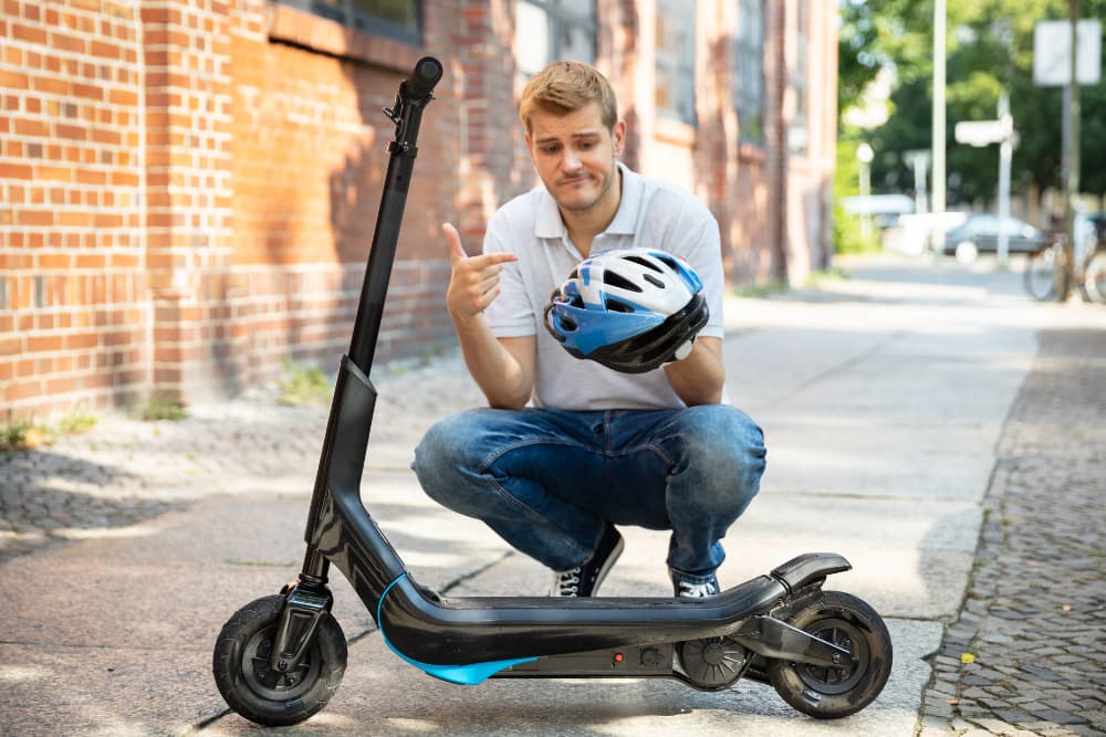 Man Complaining About Helmet For E-Scooter
